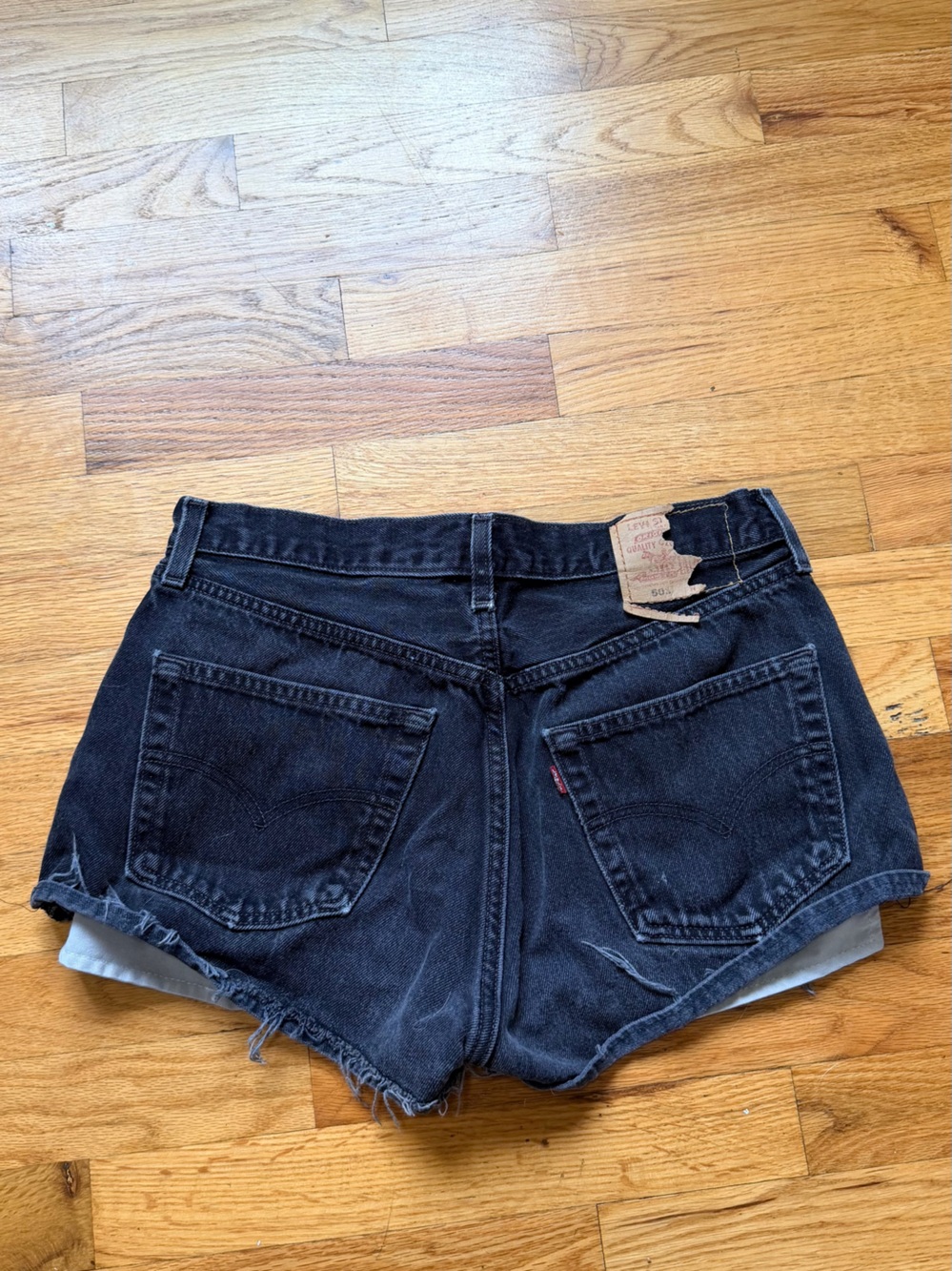 Levi's Black Denim Cutoff Shorts with Frayed Hem